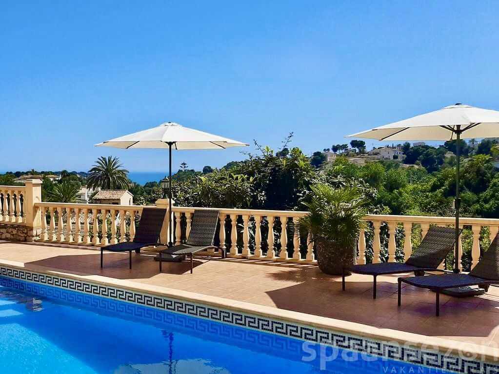 Sunbeds at the terrace of villa Terramar in Benissa Costa