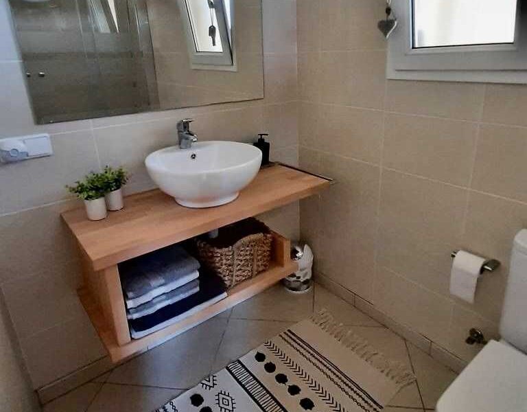 Bathroom with shower sing and toilet